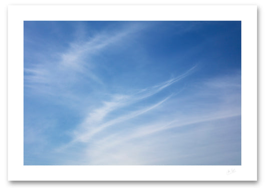 a fine art photographic print of feather shaped cirrus clouds over Dooey Beach in Donegal on a summer evening