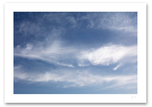 a fine art photographic print of the sky and clouds above Dooey Beach in Donegal resembling the familiar pattern of the Great Red Spot on Jupiter