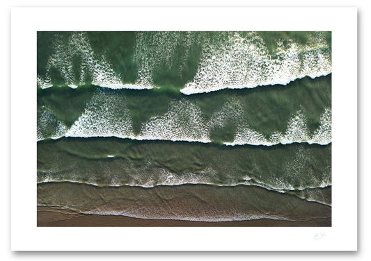 a fine art photographic print of Atlantic waves making their way on to shore at Dooey Beach in Donegal along the Wild Atlantic Way
