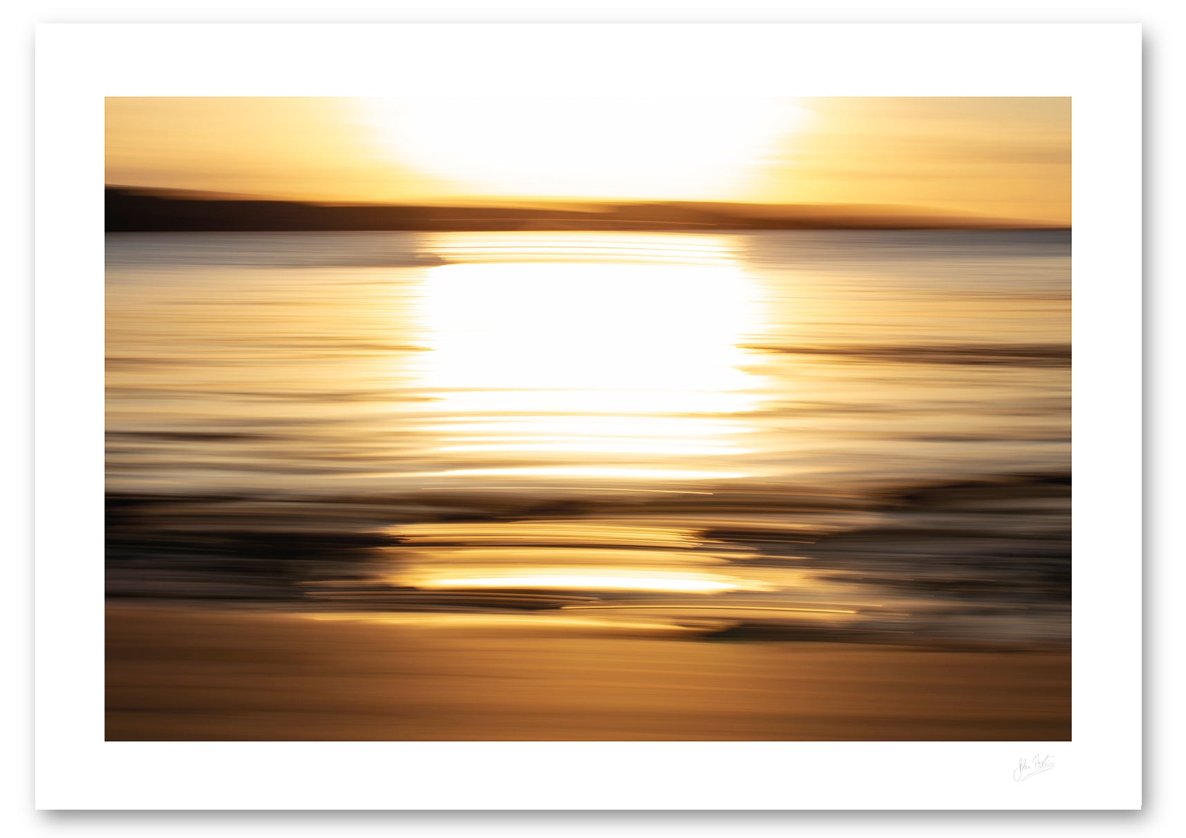 a fine art photographic print of the wonderful golden light of a setting sun across Cleggan Bay in Connemara