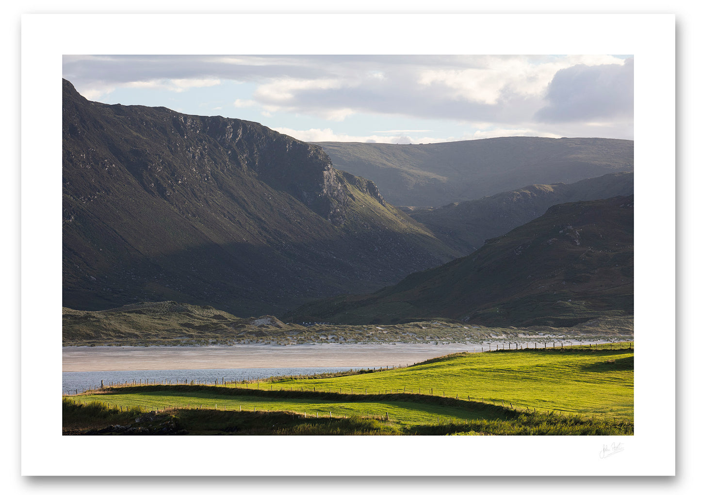 a fine art photograph view of Maghera Strand in Co. Donegal from across Loughros Beg Bay with Owenwee valley and waterfall in the background