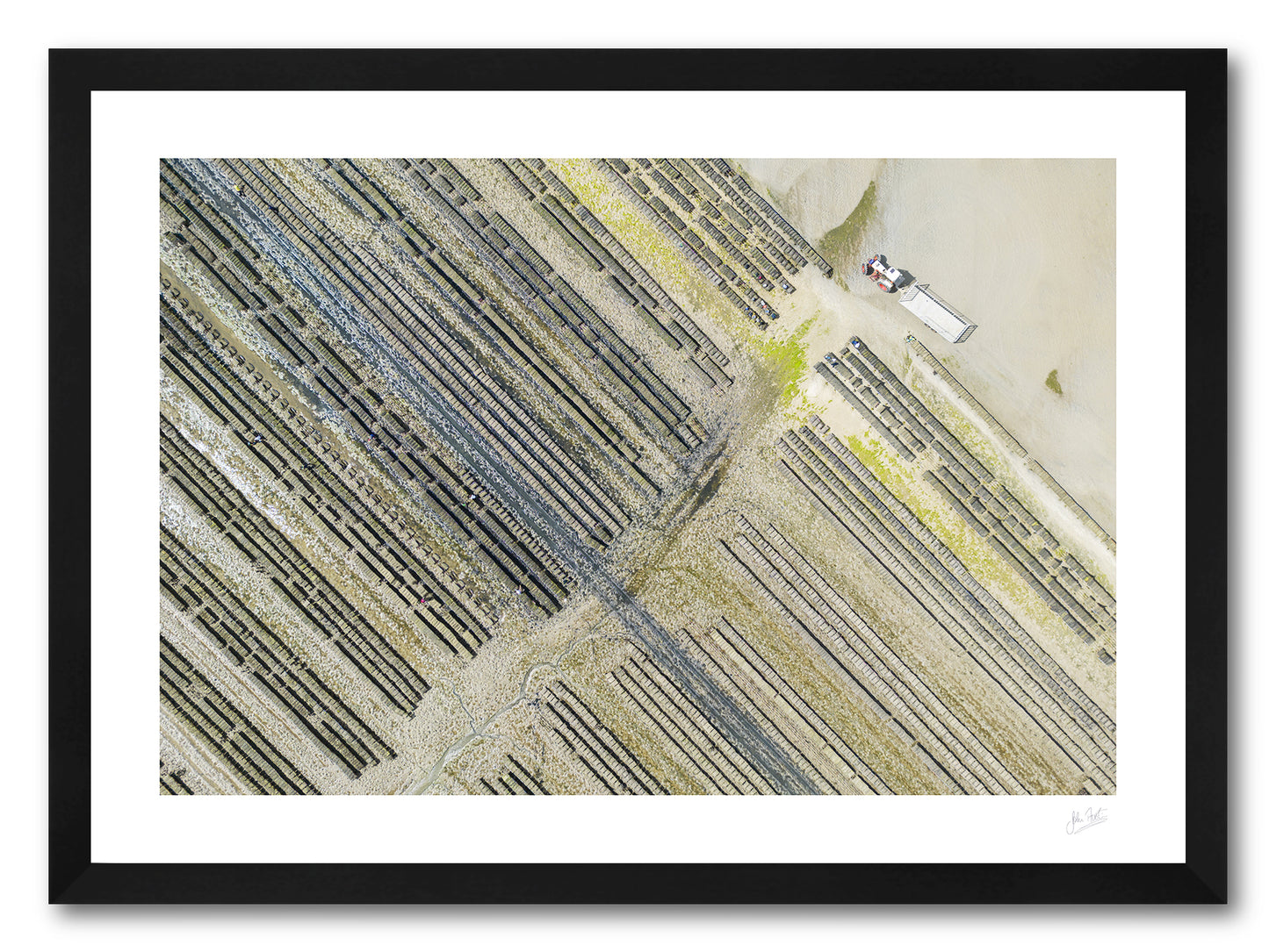 a framed photographic print of an aerial view of an oyster farm on Loughros Beg Bay in Donegal