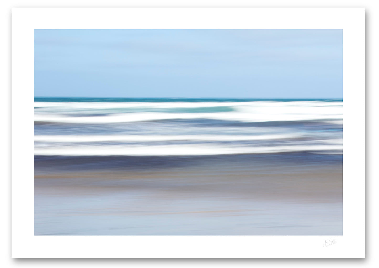 an unframed fine art photograph using intentional camera movement of white waves off Famara Beach, on the island of Lanzarote in the Canary Islands providing a lovely contrast to the blue sea and sky.