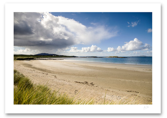 an unframed fine art photographic print of rain heading to Glassilaun Beach, Connemara on a sunny autumn afternoon, available to buy online