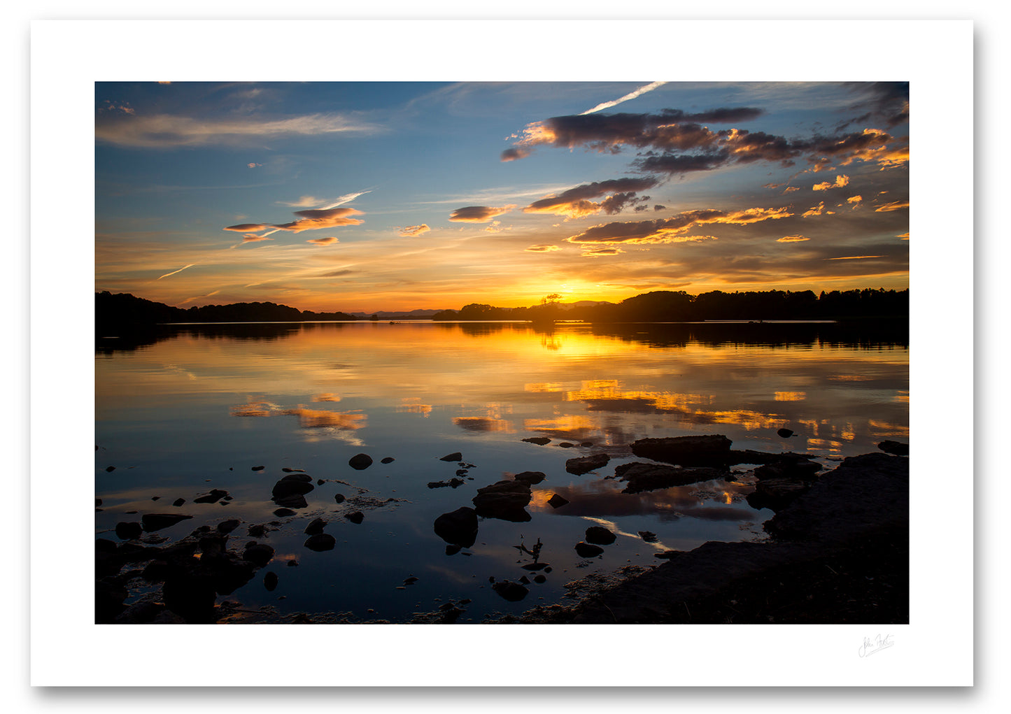 an unframed fine art photogrphic print of the beautiful colours of a sunset on Lough Leane, Killarney National Park, available to buy online