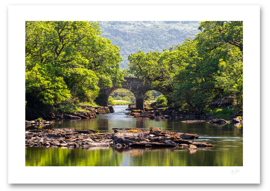 an unframed fine art photographic print of the Old Weir Bridge a the Meeting of the Waters in Killarney National Park, available to buy online