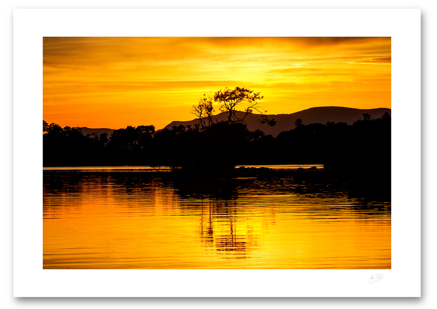 an unframed fine art photgraphic print of a the spectacular sunset colours at Lough Leane in Killarney National Park during a heatwave, available to buy online