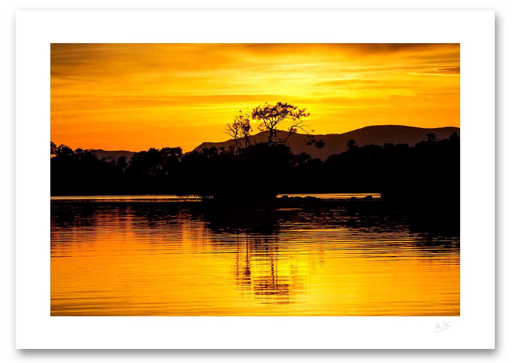an unframed fine art photgraphic print of a the spectacular sunset colours at Lough Leane in Killarney National Park during a heatwave, available to buy online