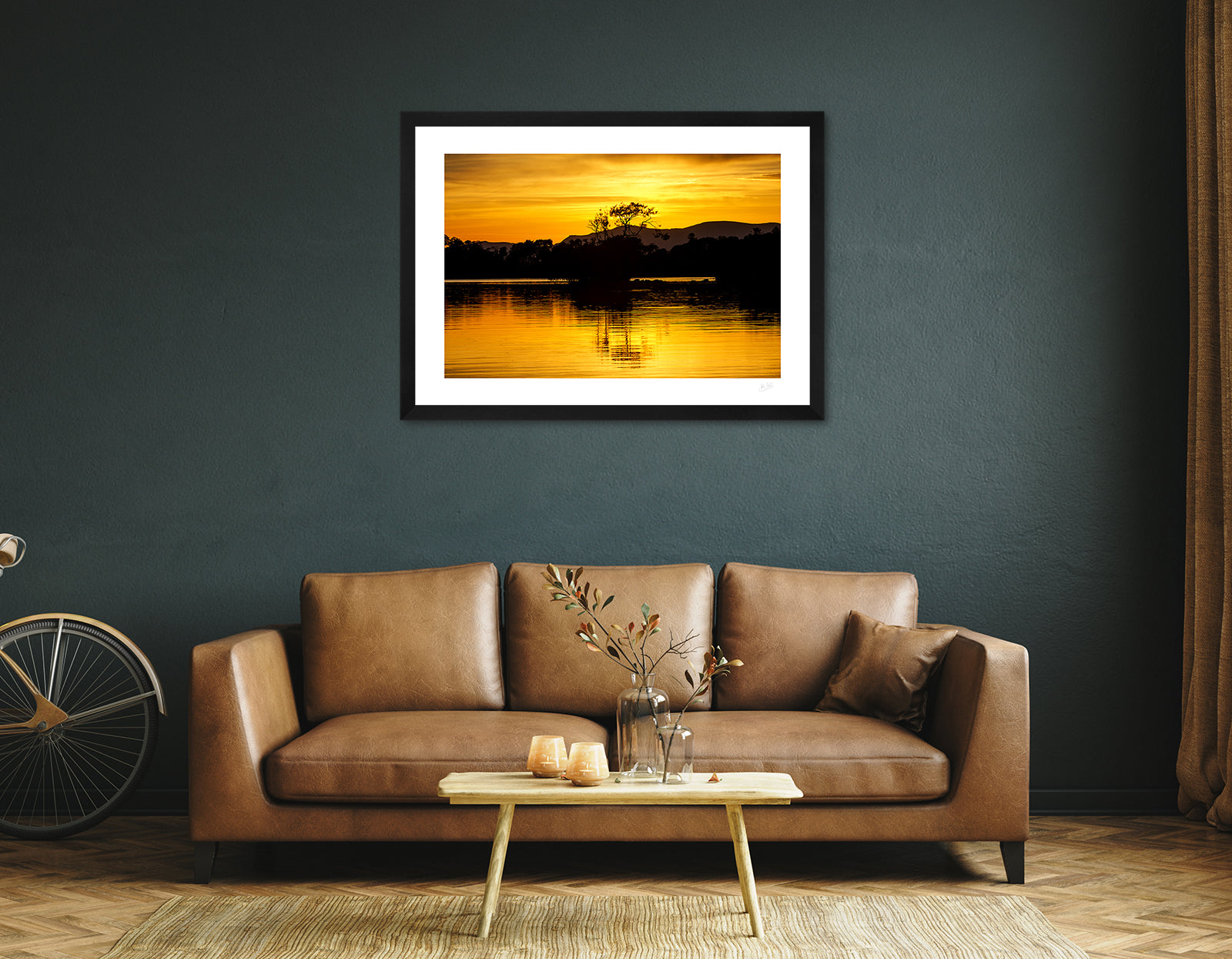 a framed fine art photgraphic print of a the spectacular sunset colours at Lough Leane in Killarney National Park during a heatwave, hanging on a living room wall