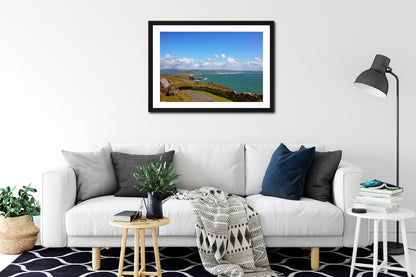 a framed print of the spectacular view of the Donegal coastline seen from Crohy Head along the Wild Atlantic Way. displayed on a living room wall.