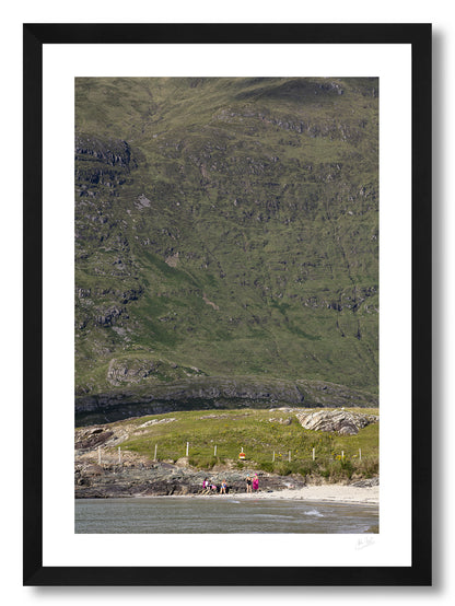 a framed fine art photogrphic print of friends catching up on a lovely summer afternoon on Glassilaun Beach, Connemara, Ireland with the large Mweelrea mountain as the background.