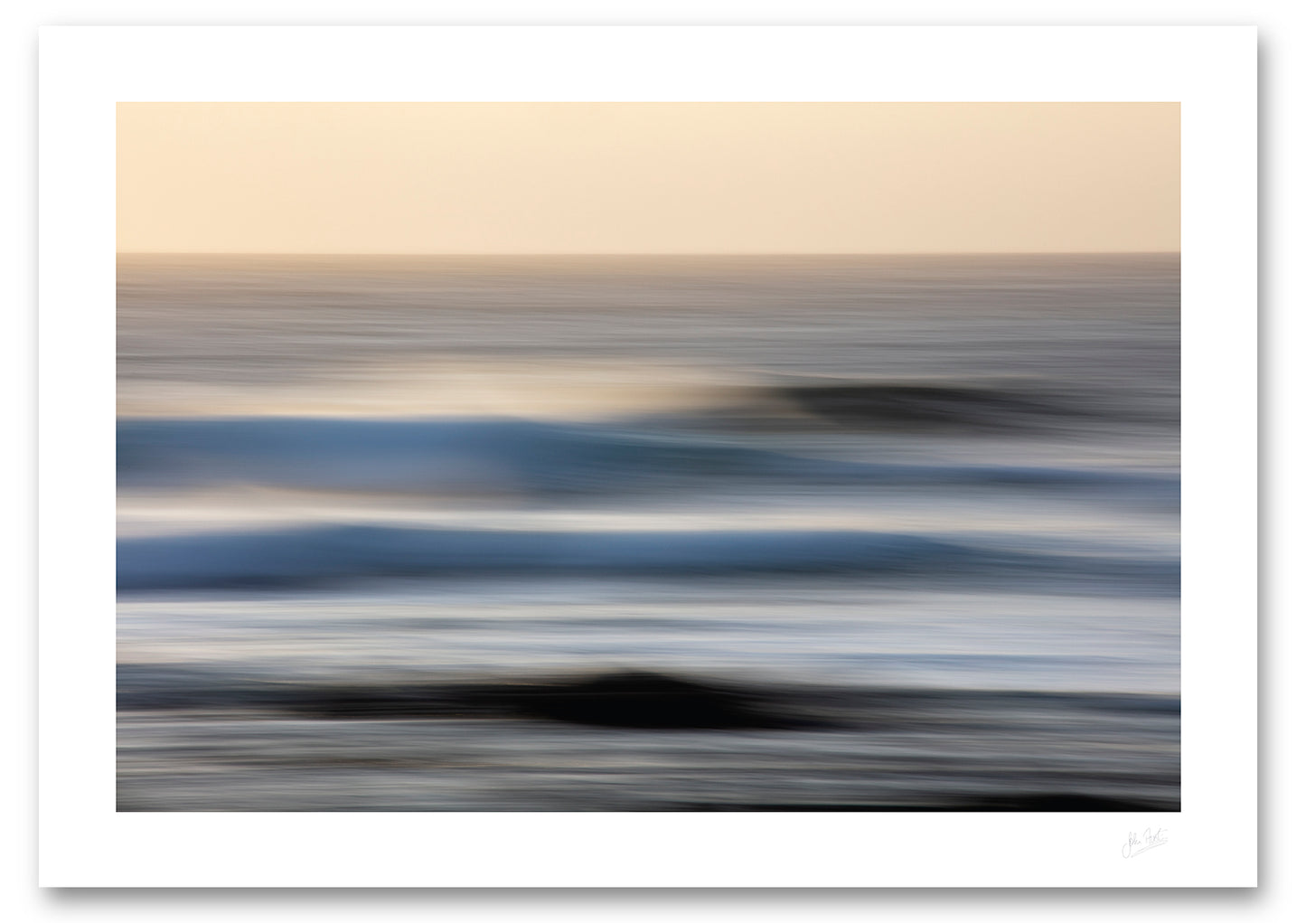 a fine art photographic print of the endless nature of the waves at el Golfo, Lanzarote side lit by the evening sun