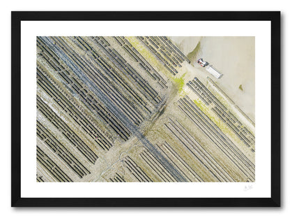 a framed photographic print of an aerial view of an oyster farm on Loughros Beg Bay in Donegal