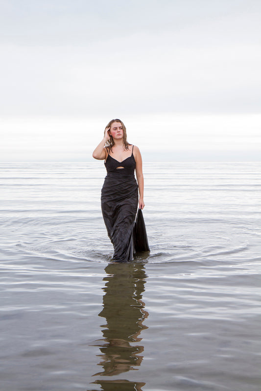 Isobel Jennings modeling in the sea during a cover photoshoot for her CD single "Drift"