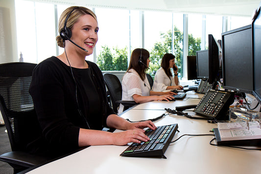 a young woman at her desk in an office setting for Bank of Ireland Premier Banking service 